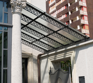 Iron and Glass Canopies with Decorative Inserts for Office Building Entrances