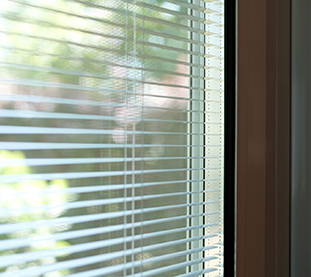 Venetian blinds on the inside of the room