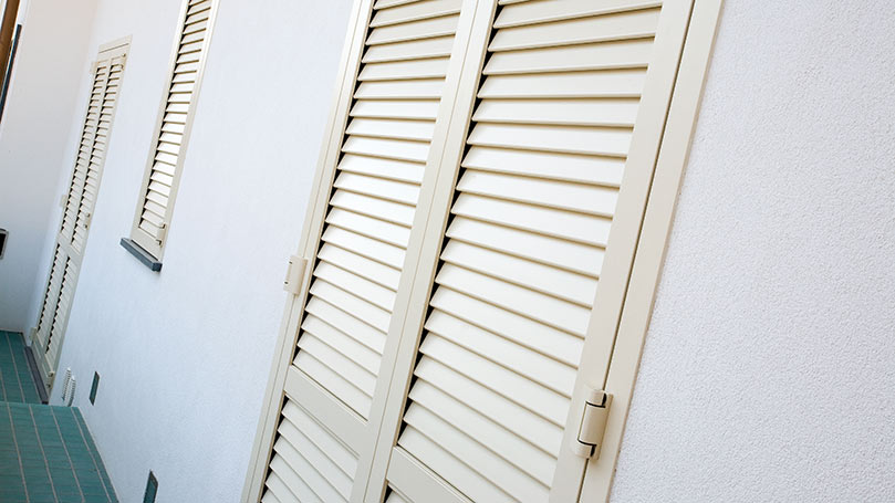 White Armoured Shutters with Anti-Dard System and Wall Fastening Frame