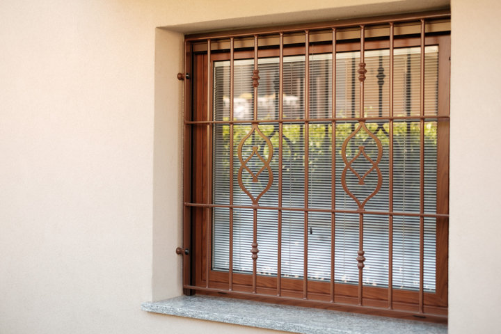 wrought iron grating and aluminium window wood colour produced and installed by aluser