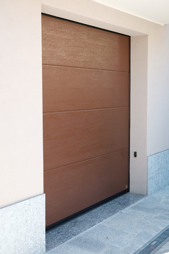 wood-coloured garage doors installed by aluser