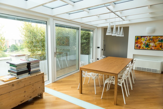 terrace enclosures installed by the aluser team in milan in a design apartment